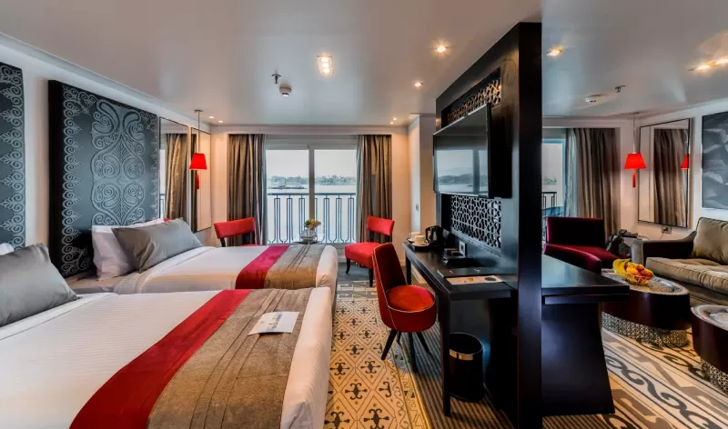 Elegant cabin aboard MS Mayflower Nile Cruise – plush bedding and panoramic river window